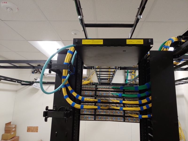 Real commercial rack during cable termination